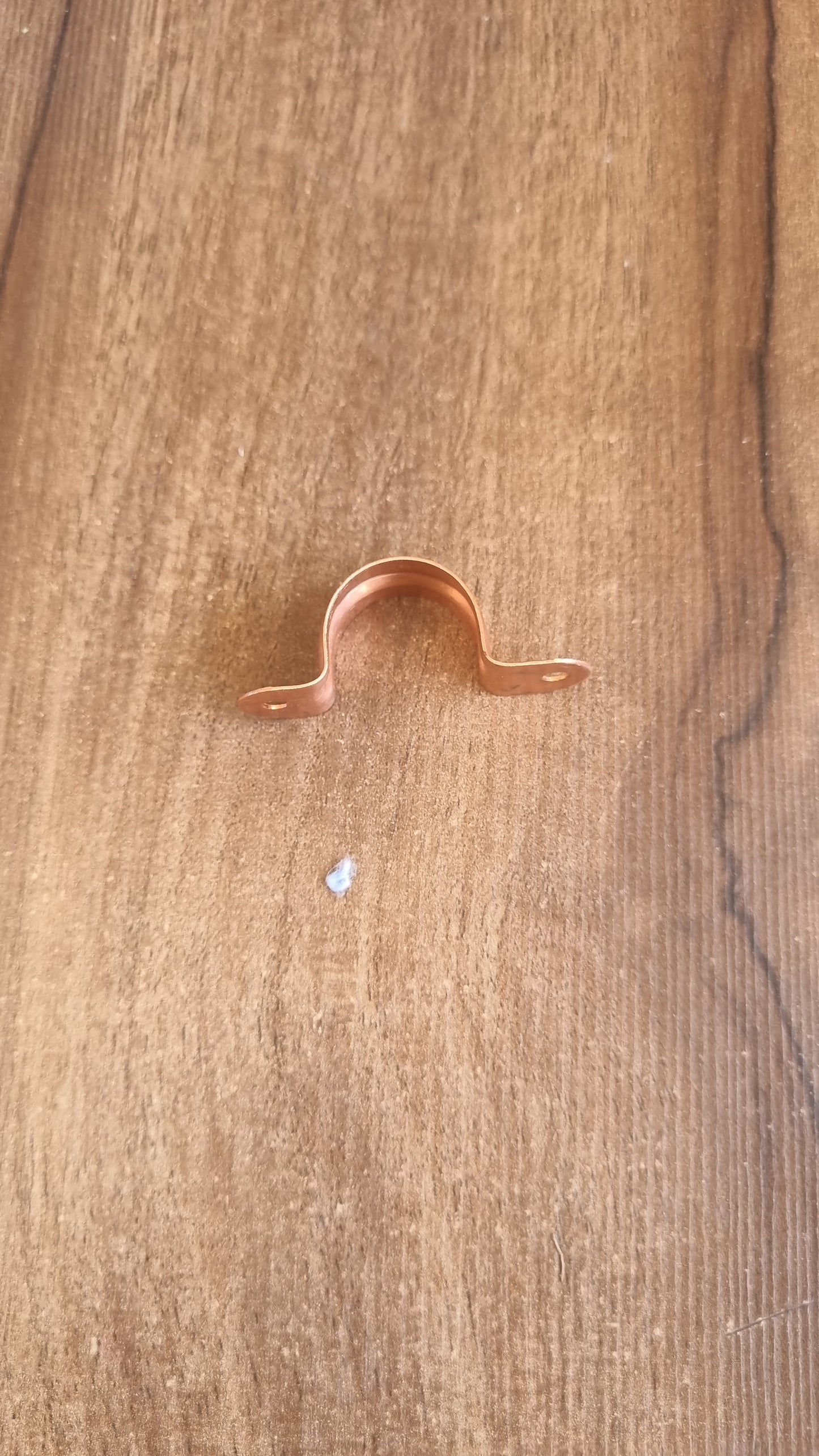 Abrazadera de cobre 1/2" 5 UN.